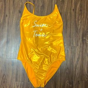 Gold Shimmer bathing suit/ body suit size: 7-9